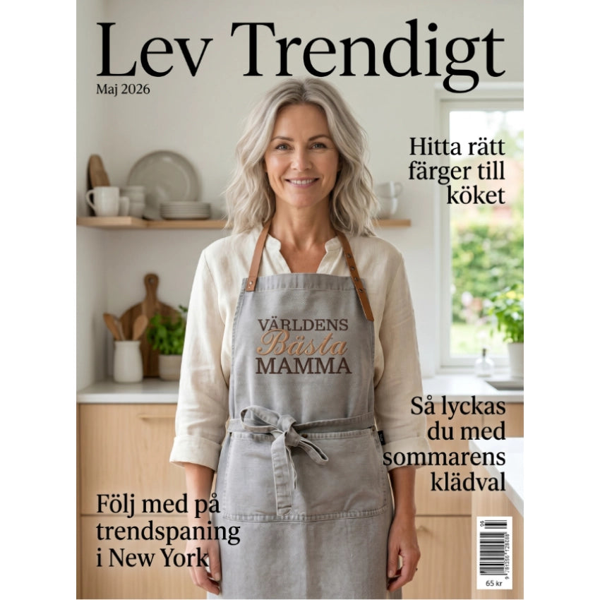 Modemagasin med kvinna i broderat förkläde