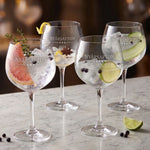 graverade glas med gin och tonic