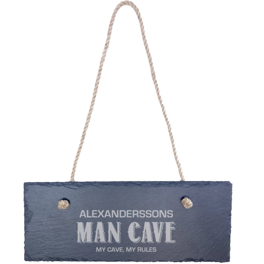 Dörrskylt till man cave med namn